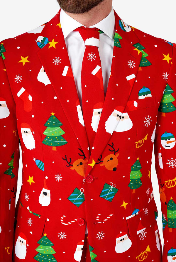 Man draagt ​​een rood kerstpak
