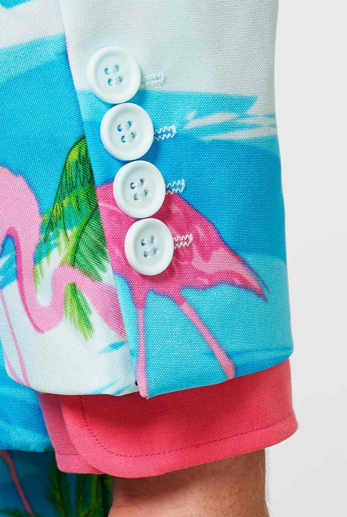 Blauw en wit pak met tropische flamingo print mouw