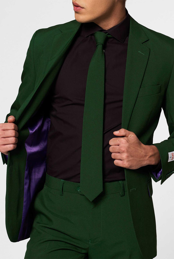 Vast gekleurde donkergroene herenpak glorieus groen gedragen door mannen in de zak