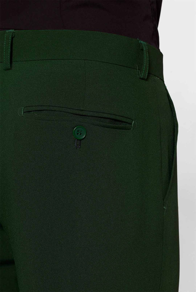 Massief donkergroen pak glorieus groen gedragen door mannen achterzijde broek zak