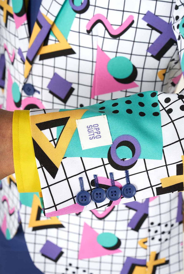 Man draagt ​​Memphis Group Retro -stijl herenpak, mouw close -up
