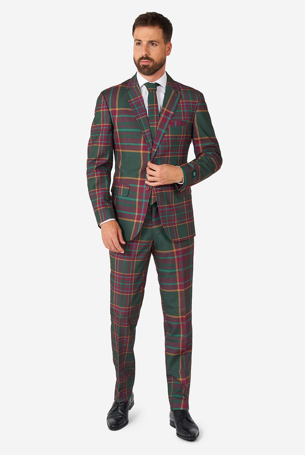 Man draagt ​​een tartan plaid kerstpak