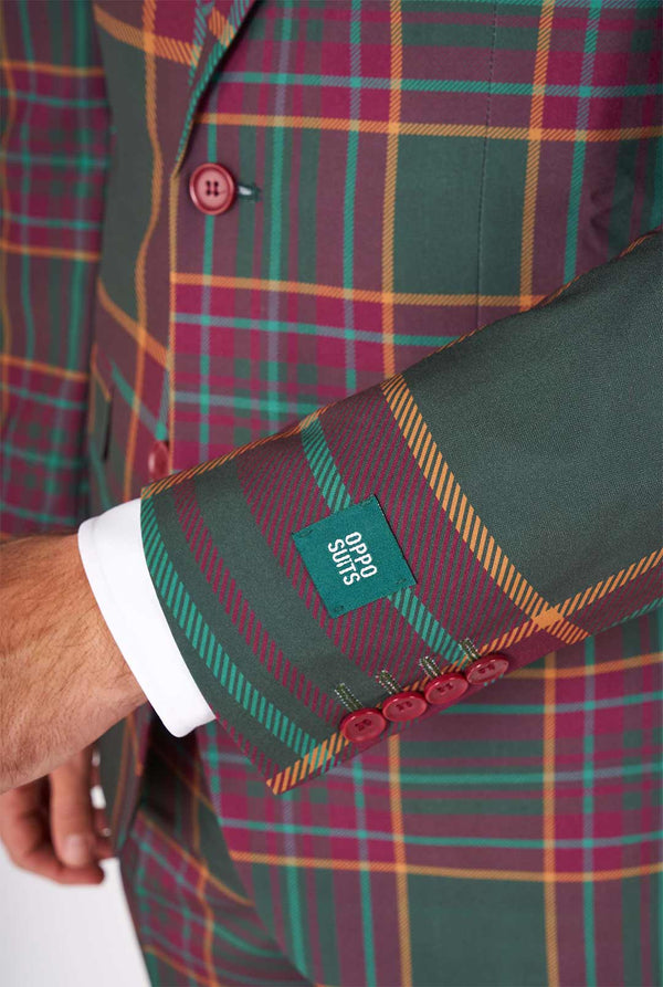 Man draagt ​​een tartan plaid kerstpak, close -up mouw