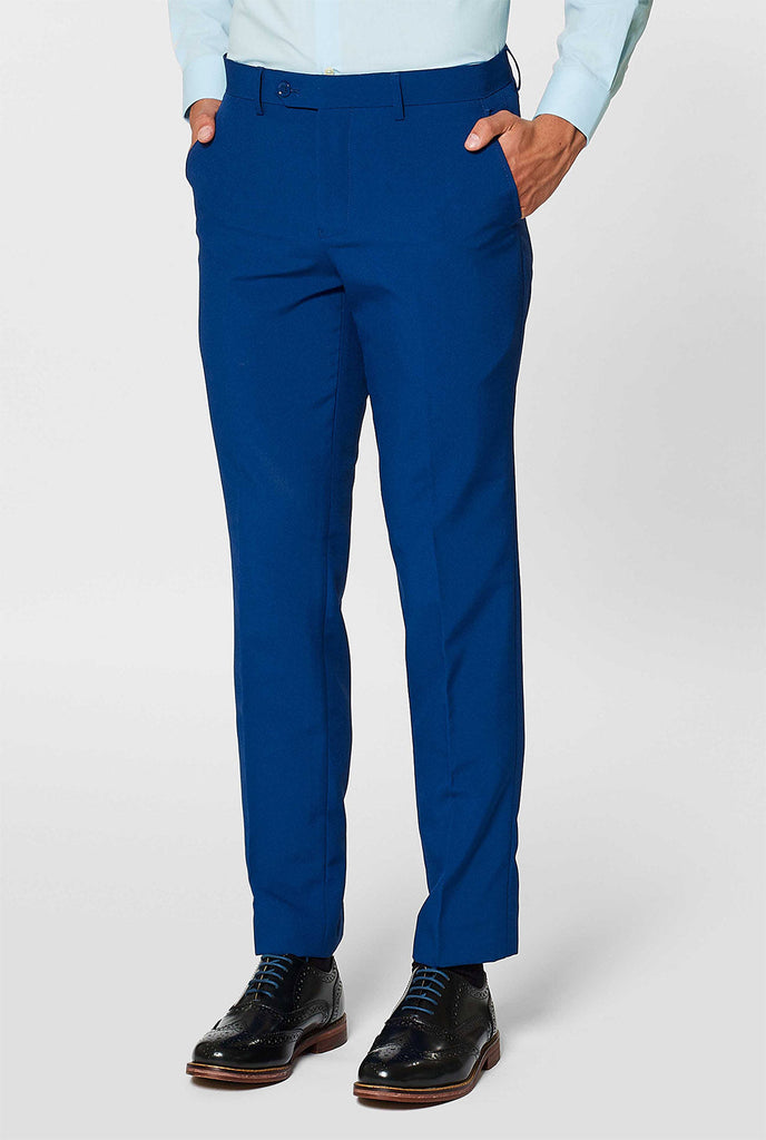 Marineblauwe broek onderdeel van marineblauw herenpak gedragen door de mens