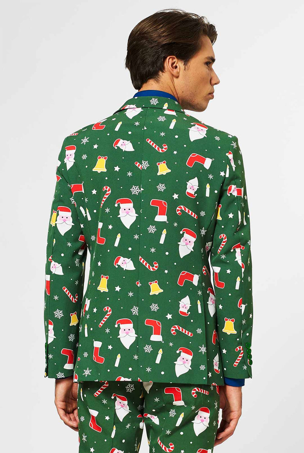 Man draagt ​​een groen kerstpak en blauw overhemd