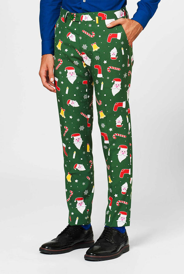 Man draagt ​​een groen kerstpak en blauw overhemd, uitzicht op broeken