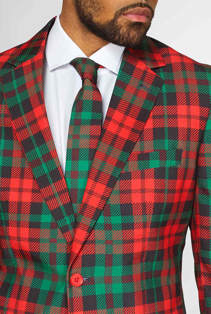 Groene en rode tartan kerstmerenpak gedragen door de mens