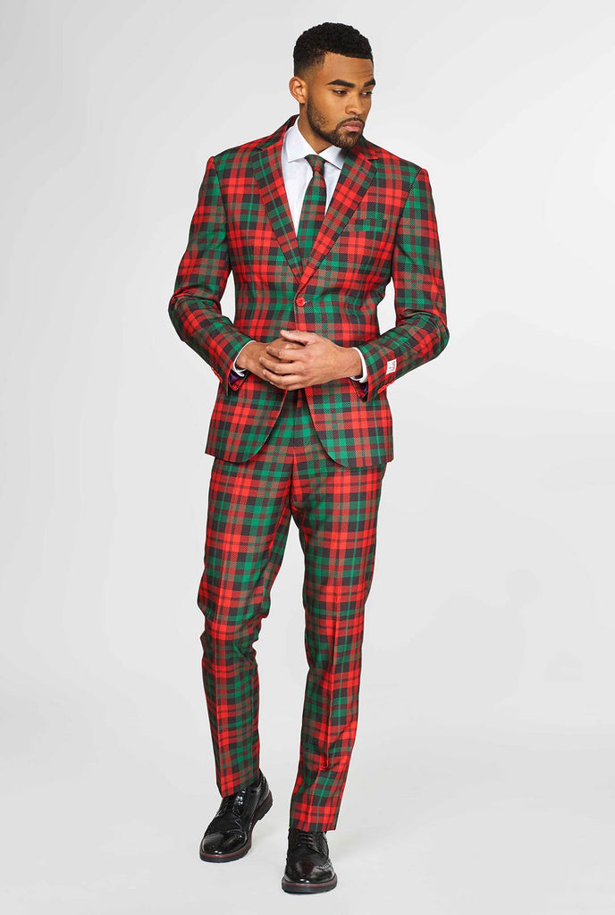 Groene en rode tartan kerstmerenpak gedragen door de mens