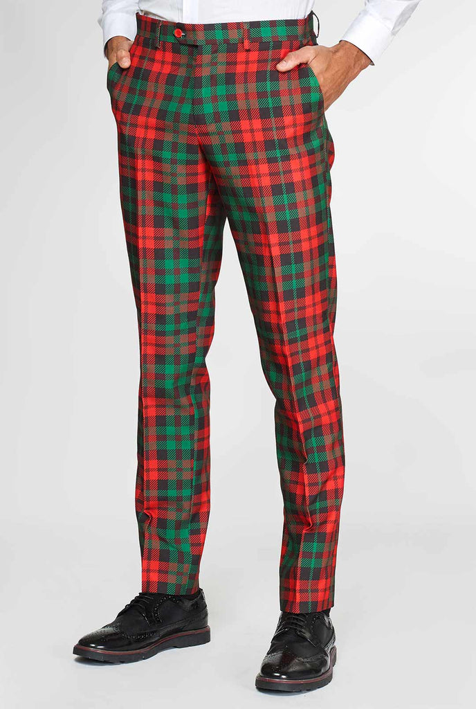 Groene en rode tartan pak broek gedragen door de mens