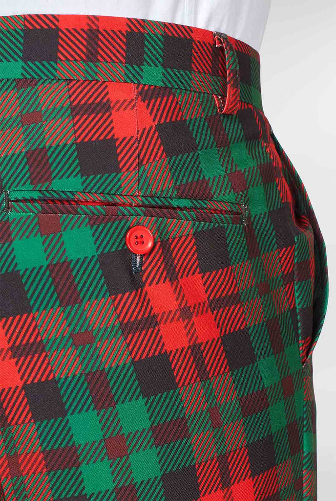 Achter van groene en rode tartan pak broek gedragen door de mens