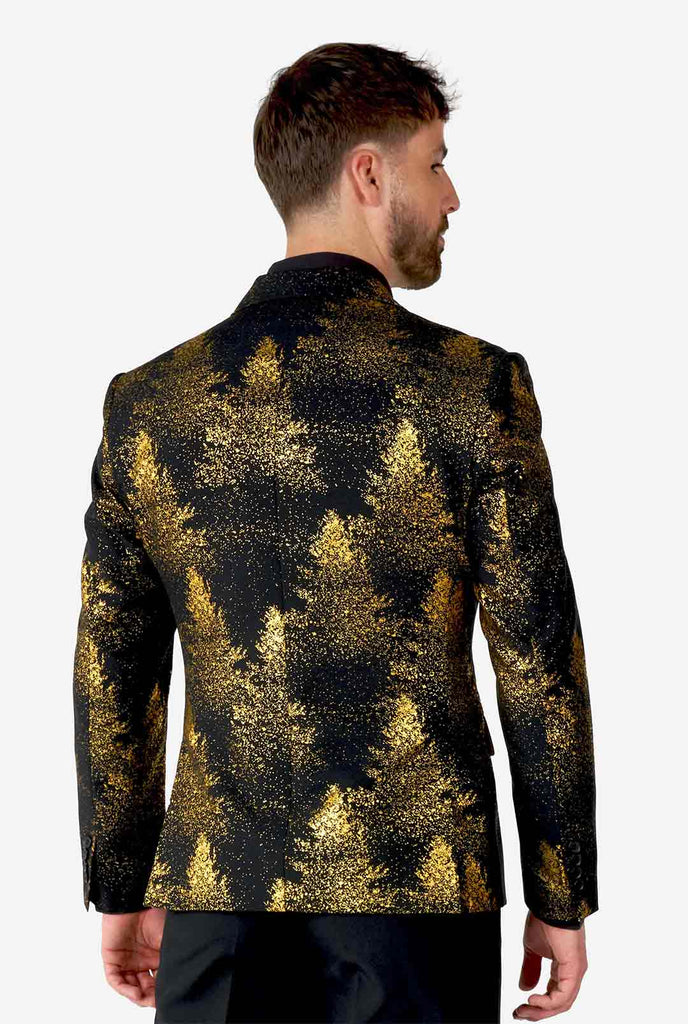 Man draagt ​​zwarte blazer met gouden kerstboomafdruk, bekijk vanaf de achterkant