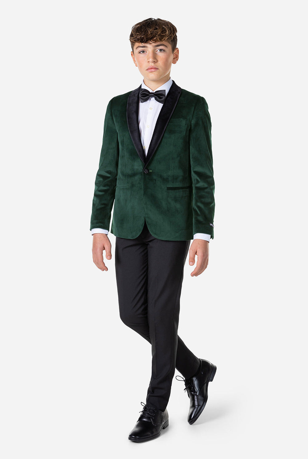 Tiener met groen fluwelen kerstdiner jas