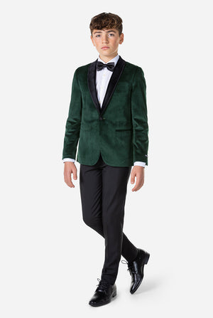 Tiener met groen fluwelen kerstdiner jas