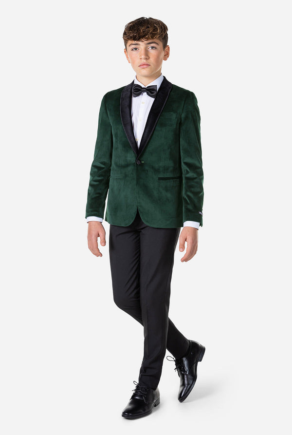 Tiener met groen fluwelen kerstdiner jas