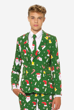 Tiener met groen kerstpak