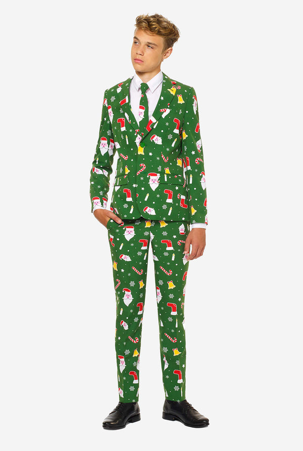 Tiener met groen kerstpak
