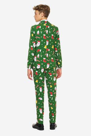 Tiener met groen kerstpak