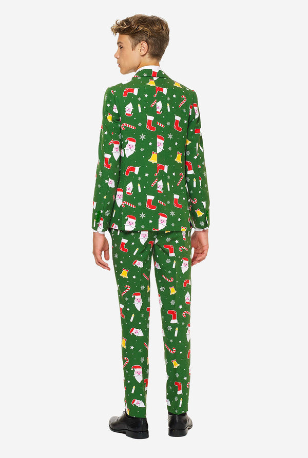 Tiener met groen kerstpak