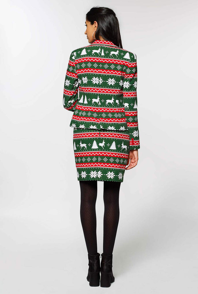 Vrouw met groen en rood kerstpak, bekijk vanaf de achterkant