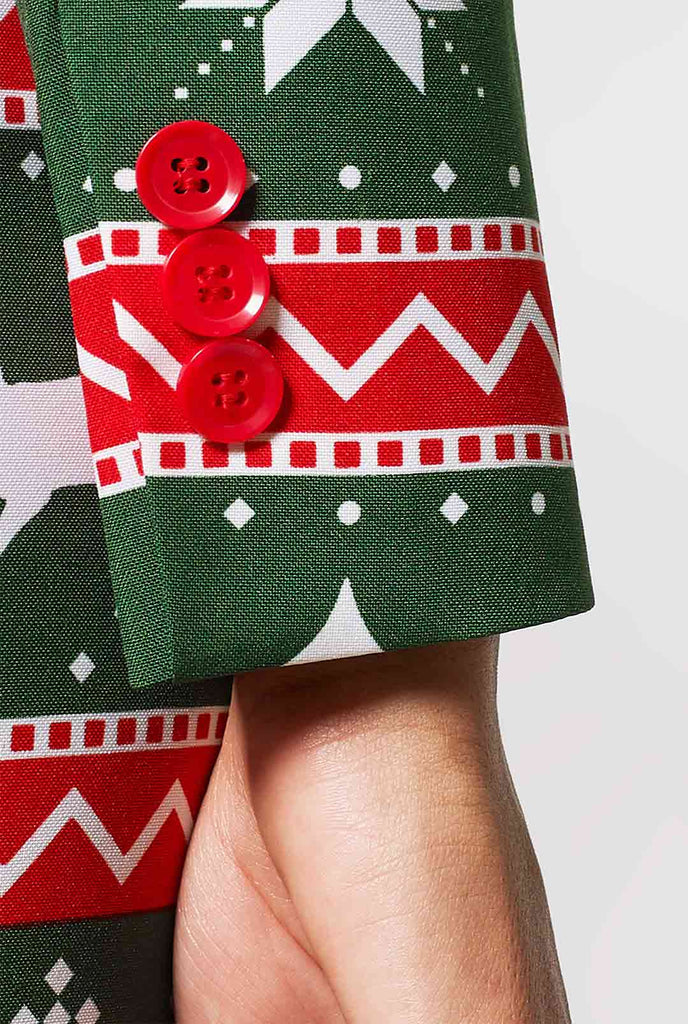 Vrouw met groen en rood kerstpak, mouw close -up