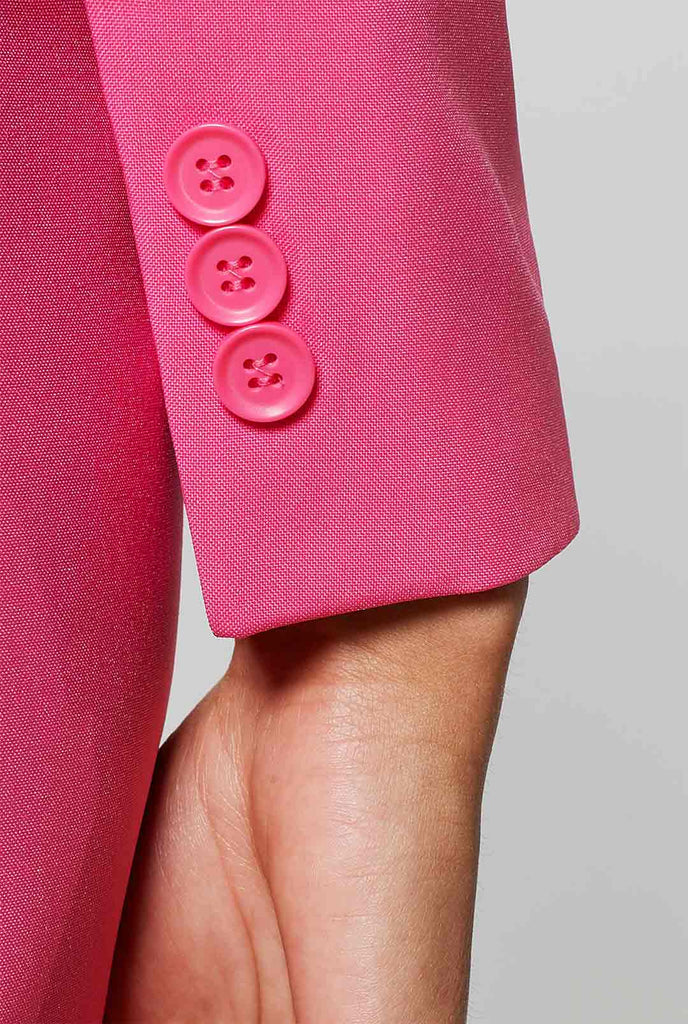 Vrouw met roze jurkpak, mouw close -up