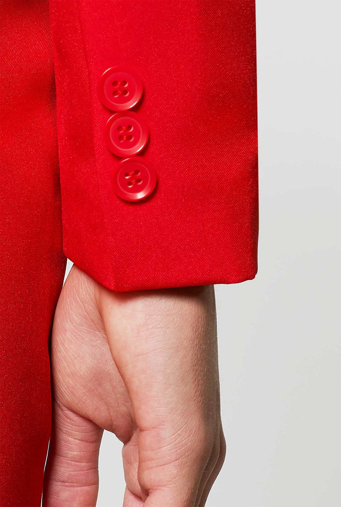 Vrouw met rode jurkpak, mouw close -up