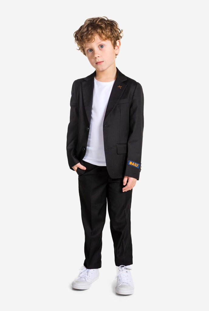 Boy wearing black OppoSuits Daily kids suit