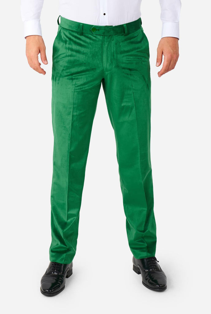Man wearing St. Patrick's Day green velvet tuxedo, pants view.
